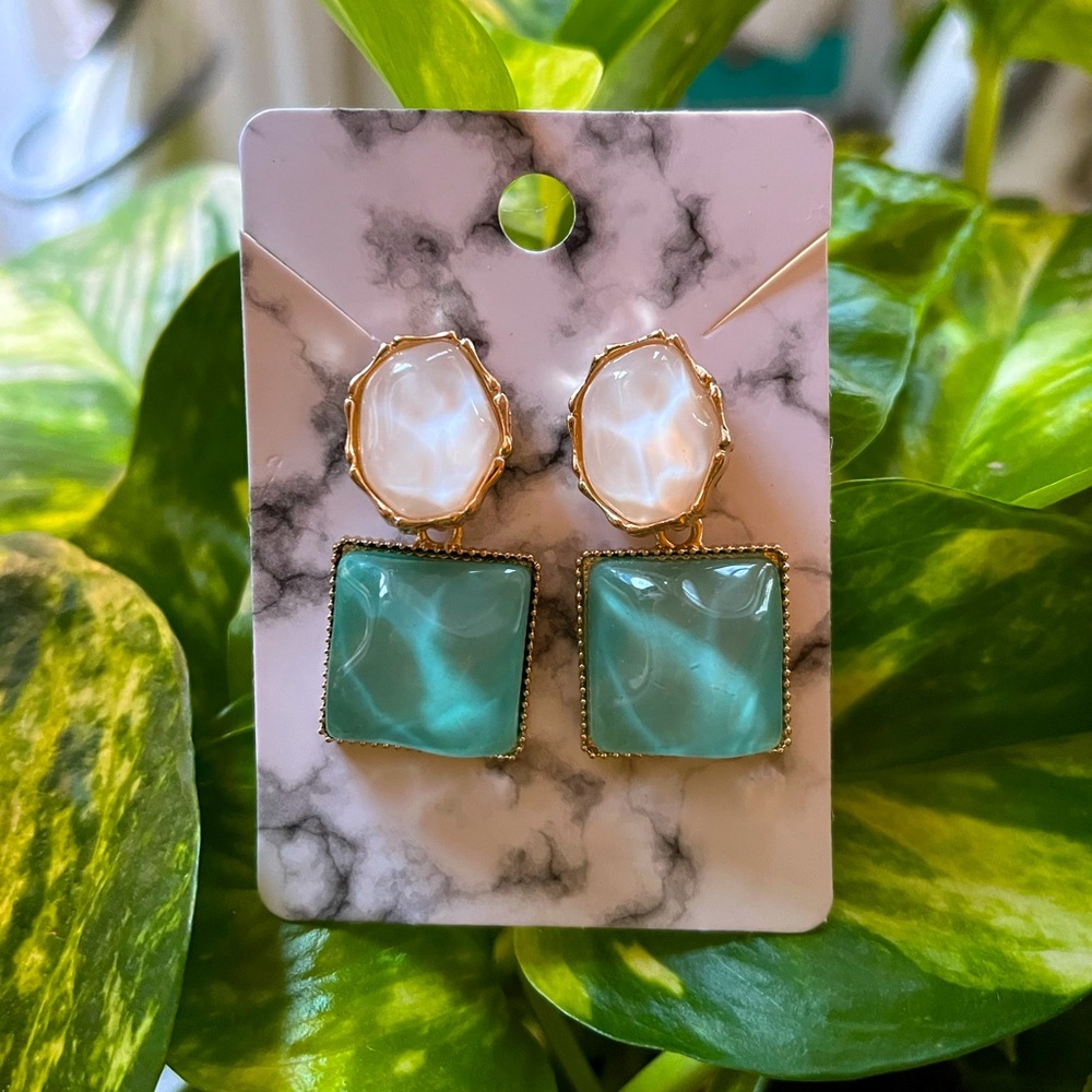 Green and white earrings